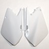 Plaques numéro latérales Ufo Plast pour Suzuki RM125/250 03-05